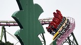 Taman Hiburan Tokyo Dibuka Kembali Visitors ride the roller coaster at the newly-opened Yomiuriland amusement park in Tokyo, Tuesday, June 16, 2020. The park has been closed since the end of March as a part of the precautions to help curb the spread of the coronavirus. (AP Photo/Eugene Hoshiko)