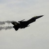A Turkish air force fighter jet performs a fly over on February 25, 2014 during celebrations to mark Kuwait's 53rd National Day and the 23rd Liberation Day. The first date commemorates the creation of Kuwait as a nation in 1961 while Liberation Day m