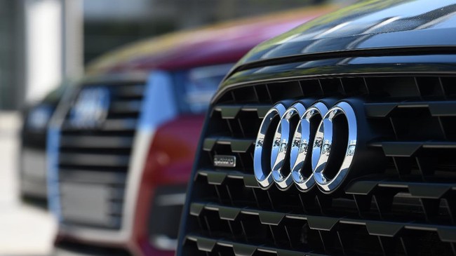 The logo of German carmaker Audi is pictured on new Audi cars on the sidelines of the Audi AG annual general meeting in Ingolstadt, southern Germany, on May 9, 2018. (Photo by CHRISTOF STACHE / AFP)