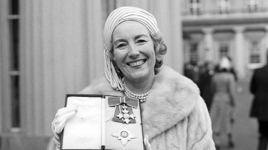 Britain Obit Vera Lynn FILE - In this Dec. 2, 1975 file photo, singer Vera Lynn poses outside Buckingham Palace after being invested a Dame Commander of the British Empire. The family of World War II forces sweetheart Vera Lynn says she has died. She was 103 it was reported on Thursday, June 18, 2020. (PA via AP, File)