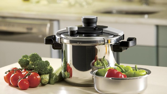 Pressure cooker; photo about stove in the kitchen.