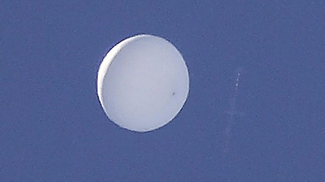 This picture taken on June 17, 2020 shows an unidentified flying object above Aoba Ward in Sendai. - The unidentified flying object was first spotted on June 17 morning, when residents in northern Sendai city took to social media to post pictures and debate what they were seeing. (Photo by STR / JIJI PRESS / AFP) / Japan OUT