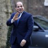 President of Egypt Abdel Fattah el-Sisi gestures as he walks to 10 Downing Street in central London on January 21, 2020, ahead of their meeting. (Photo by Tolga AKMEN / AFP)