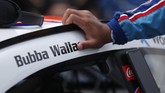 Bubba Wallace Driver Bubba Wallace leans on his car in the pits of the Talladega Superspeedway prior to the start of the NASCAR Cup Series auto race at the Talladega Superspeedway in Talladega Ala., Monday June 22, 2020. (AP Photo/John Bazemore)
