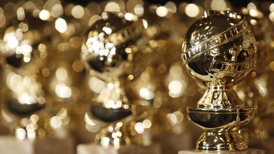 FILE - In this Jan.. 6, 2009, file photo, Golden Globe statuettes are seen during a news conference at the Beverly Hilton Hotel in Beverly Hills, Calif. The Hollywood Foreign Press Association says the ceremony will be held Feb. 28, 2021. (AP Photo/Matt Sayles, File)