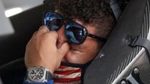 NASCAR-Talladega-Noose Auto Racing Driver Bubba Wallace, right, is overcome with emotion as he sits in his car prior to the start of the NASCAR Cup Series auto race at the Talladega Superspeedway in Talladega Ala., Monday June 22, 2020. A noose was found in the garage stall of Wallace's car yesterday. (AP Photo/John Bazemore)