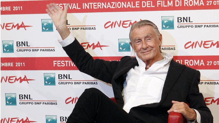 FILE - In this Nov. 3, 2011 file photo, director Joel Schumacher waves during a photo call for Cinema and Advertising: Joel Schumacher directs Campari, at the Rome International Film Festival. A representative for Schumacher said the filmmaker died Monday, June 22, 2020, in New York after a year-long battle with cancer. He was 80. (AP Photo/Pier Paolo Cito, File)