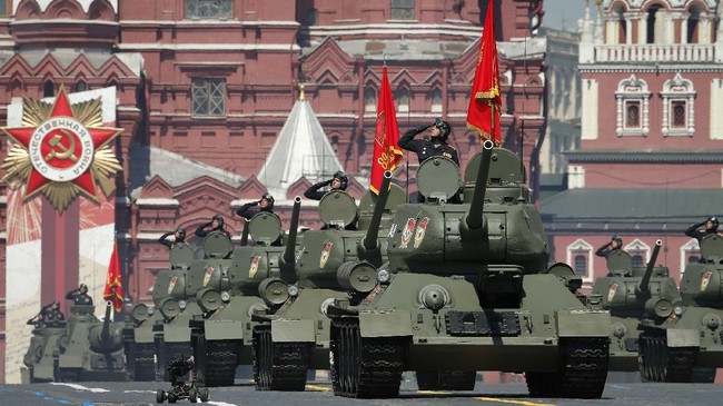 Soviet tanks T-34 roll toward Red Square during the Victory Day military parade marking the 75th anniversary of the Nazi defeat in Moscow, Russia, Wednesday, June 24, 2020. The Victory Day parade normally is held on May 9, the nation's most important secular holiday, but this year it was postponed due to the coronavirus pandemic. (AP Photo/Alexander Zemlianichenko)