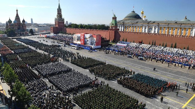 Parade formations are seen ahead of the military parade marking the 75th anniversary of the Nazi defeat on Red Square in Moscow, Russia, Wednesday, June 24, 2020.  The Victory Day parade normally is held on May 9, the nation's most important secular holiday, but this year it was postponed due to the coronavirus pandemic. (Mikhail Voskresenskiy, Host Photo Agency via AP)