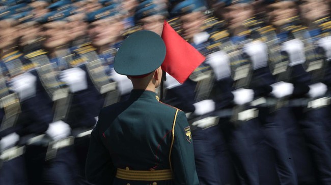 Russian soldiers march toward Red Square during the Victory Day military parade marking the 75th anniversary of the Nazi defeat in Moscow, Russia, Wednesday, June 24, 2020. The Victory Day parade normally is held on May 9, the nation's most important secular holiday, but this year it was postponed due to the coronavirus pandemic. (AP Photo/Pavel Golovkin, Pool)
