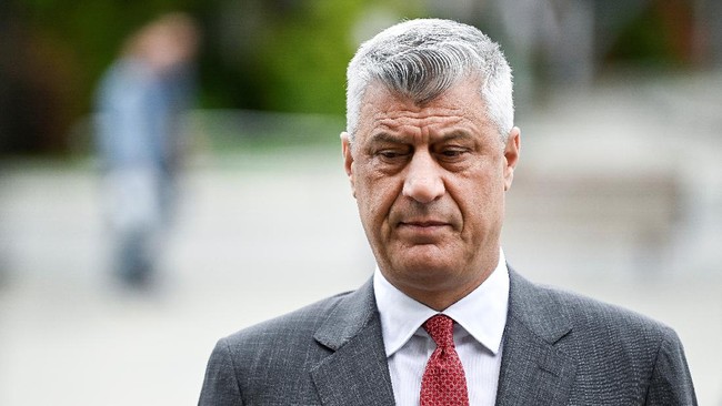 Kosovo President Hashim Thaci takes part in a tribute ceremony at a statue of late Kosovo Liberation Army (KLA) commander in Pristina on June 11, 2020, as the country celebrates the Liberation Day marking the deployment of NATO forces on the ground. (Photo by Armend NIMANI / AFP)