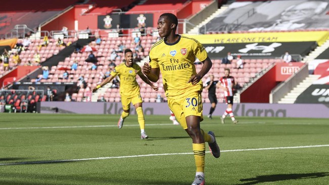 Arsenal's Eddie Nketiah celebrates after scoring a goal later disallowed for offside during the English Premier League soccer match between Southampton and Arsenal at St Mary's Stadium, in Southampton, England, Thursday, June 25, 2020. (Mike Hewitt/Pool via AP)