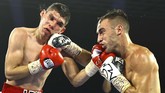 Smashshot Edisi 28 Juni 2020 LAS VEGAS, NEVADA - JUNE 25: In this handout photo provided by Top Rank, Jason Moloney fights Leonardo Baez during their bantamweight bout at MGM Grand Conference Center Grand Ballroom on June 25, 2020 in Las Vegas, Nevada. Mikey Williams/Top Rank via Getty Images/AFP
