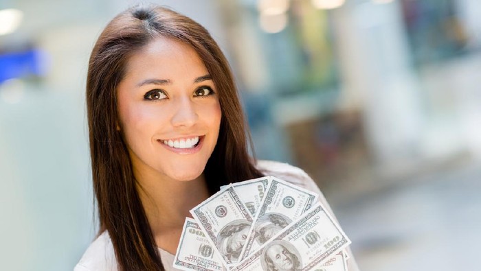 happy Asian woman hand holding smart phone and banknotes ,make money online concept