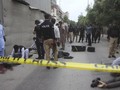 FOTO: Kantor Bursa Efek Pakistan Diserang Kelompok Bersenjata