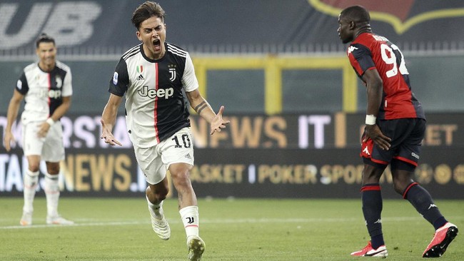 Juventus' Paulo Dybala celebrates after scoring a goal during an Italian Serie A soccer match between Genoa and Juventus at the Luigi Ferraris stadium in Genoa, Italy, Tuesday, June 30, 2020. (Tano Pecoraro/LaPresse via AP)