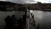 Makan Malam di Meja Sepanjang 500 meter di Jembatan Charles Praha Residents sit to dine on a 500 meter long table set on the medieval Charles Bridge, after restrictions were eased following the coronavirus pandemic in Prague, Czech Republic, Tuesday, June 30, 2020. (AP Photo/Petr David Josek)