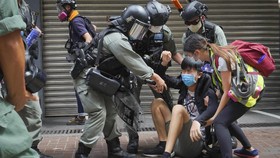 Pria Hong Kong Pertama Didakwa di Bawah UU Keamanan China