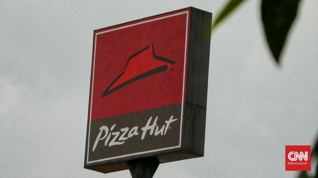 Illustrasi Waralaba Pizza Hut. Pizza Hut di Indonesia memastikan kondisi perusahaan tidak bangkrut atau mengajukan pailit. Jakarta.  Kamis (2/7/2020). CNN Indonesia/Andry Novelino