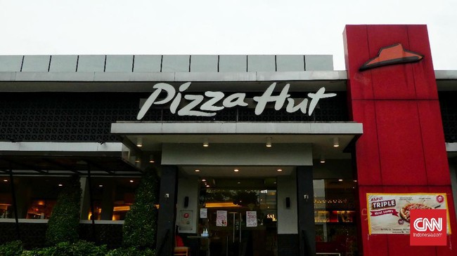 Illustrasi Waralaba Pizza Hut. Pizza Hut di Indonesia memastikan kondisi perusahaan tidak bangkrut atau mengajukan pailit. Jakarta.  Kamis (2/7/2020). CNN Indonesia/Andry Novelino