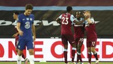 West Ham United vs Chelsea West Ham's Michail Antonio, second right is congratulated by teammates West Ham's Jarrod Bowen right and West Ham's Issa Diop after scoring his sides second goal of the game during the English Premier League soccer match between West Ham United and Chelsea at the London Stadium stadium in London, Wednesday July 1, 2020.(Julian Finney/Pool via AP)