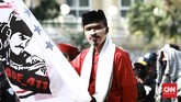 Apel Siaga Ganyang Komunis Sejumlah massa aksi 'Apel Siaga Ganyang Komunis Jabodetabek' mendatangi lapangan Ahmad Yani, Jalan Praja, Kebayoran Lama, Jakarta Selatan, Minggu (5/7/2020).
Aksi ini diikuti sejumlah organisasi kemasyarakatan (ormas) Islam seperti Front Pembela Islam (FPI), PA 212, hingga Gerakan Nasional Pengawal Fatwa (GNPF) Ulama dan beberapa perguruan pencak silat betawi, seperti Beksi, tapak suci dan lain-lain. CNN Indonesia/Andry Novelino