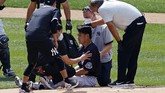 masahiro tanaka New York Yankees pitcher Masahiro Tanaka is tended to by team medical personnel after being hit by a ball off the bat of Yankees Giancarlo Stanton during a baseball a workout at Yankee Stadium in New York, Saturday, July 4, 2020. (AP Photo/Adam Hunger)