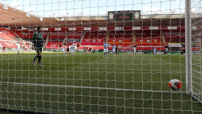 Manchester City's goalkeeper Ederson reacts after Southampton's Che Adams scored his team's first goal during the English Premier League soccer match between Southampton and Manchester City at St. Mary's Stadium in Southampton, England, Sunday, July 5, 2020. (AP Photo/Frank Augstein,Pool)