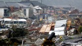 Pencarian Korban Banjir di Jepang Debris is scattered at a residential area hit by heavy rain in Kumamura, Kumamoto prefecture, southern Japan Tuesday, July 7, 2020. Rescue operations continued and rain threatened wider areas of the main island of Kyushu. (Kota Endo/Kyodo News via AP)