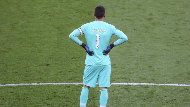 Tottenham's goalkeeper Hugo Lloris during the English Premier League soccer match between Tottenham Hotspur and Everton FC at the Tottenham Hotspur Stadium in London, England, Monday, July 6, 2020. (Cath Ivill/Pool via AP)