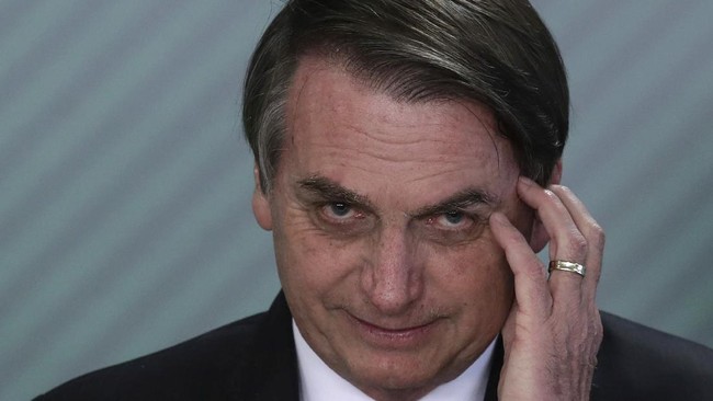 FILE - In this April 9, 2019 file photo, Brazil's President Jair Bolsonaro speaks during a swearing-in ceremony at the Planalto Presidential Palace, in Brasilia, Brazil. Bolsonaro’s latest education minister offered his resignation Tuesday, June 30, 2020, just days after his appointment, creating a new headache for the embattled leader as he struggles to start a new chapter at the ministry and shore up flagging support. (AP Photo/Eraldo Peres, File)
