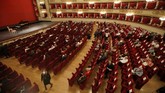 Opera La Scala Buka Kembali Spectators sit apart from each other to respect social distancing, prior to a show at the La Scala theater in Milan Italy, Monday, July 6, 2020. La Scala opera house reopened Monday after a four-month shutdown due to the COVID-19 restriction measures. (AP Photo/Antonio Calanni)