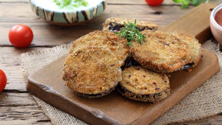 fried eggplant on kitchen table background