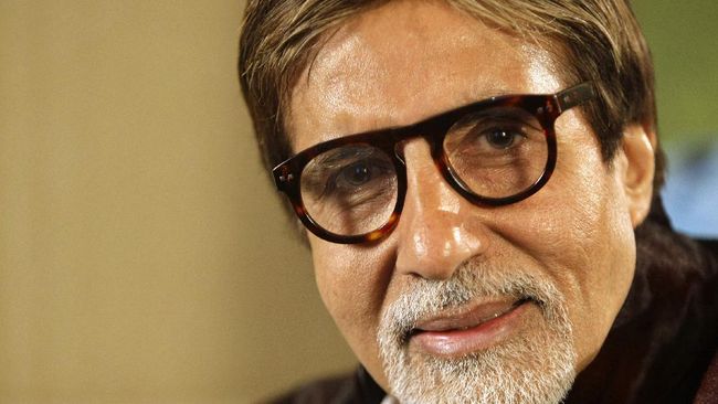 FILE - In this Nov. 10, 2009 file photo, Bollywood legend Amitabh Bachchan speaks during an interview in London. Bachchan has tested positive for COVID-19 and hospitalised in Mumbai, India's financial and entertainment capital. In a tweet on Saturday, July 11, 2020, Bachchan, 77, said his family and staff have also undergone tests and results are awaited. (AP Photo/Alastair Grant, File)