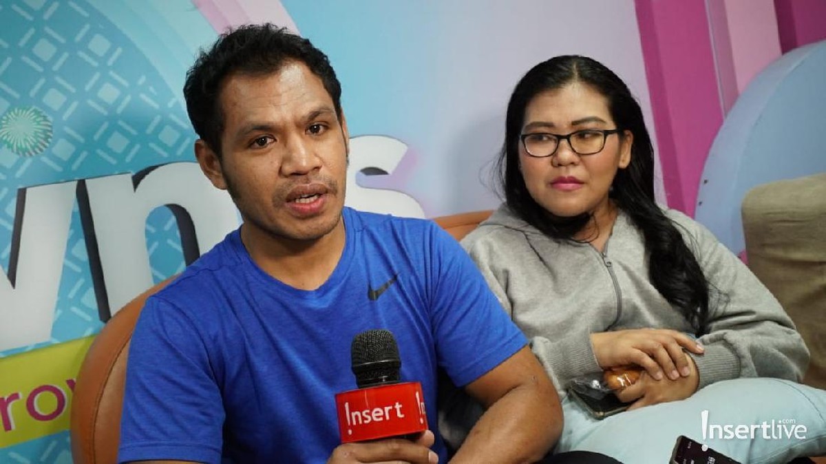 Andre Talabessy dan sang istri