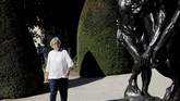 Museum Rodin Dibuka Kembali Rodin museum director Catherine Chevillot poses in the garden of Rodin museum in Paris Tuesday, July 7, 2020. The Musee Rodin is reopening this morning albeit with a worrying loss of visitors and income caused by the four-months closure. Catherine Chevillot, estimates the loss incurred by the crisis to be around 4.4 million euros (4.9 US dollars) and alleviated by the 1.4 million euro sales of bronze editions of Rodin statues. The museum doesn't sell Rodin statue originals but can sell 12 bronze replica editions of each of them, as it has been for 100 years. (AP Photo/Christophe Ena)