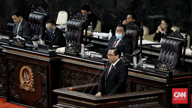 DPR RI menggelar Rapat Paripurna ke-18 Masa Persidangan IV Tahun Sidang 2020. Salah satu agenda yang dibahas tentang pengambilan keputusan perubahan ketiga tentang Pemilihan Gubernur, Bupati, Dan Wali Kota menjadi Undang-Undang (UU). Jakarta (14/7/2020).Sidang paripurna juga di hadiri ketua BPK Agung Firman Sampurna. CNN Indonesia/Andry Novelino