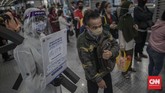 Manusia Covid Sejumlah anggota komunitas Transjakarta melakukan sosialisai dengan berpenampilan