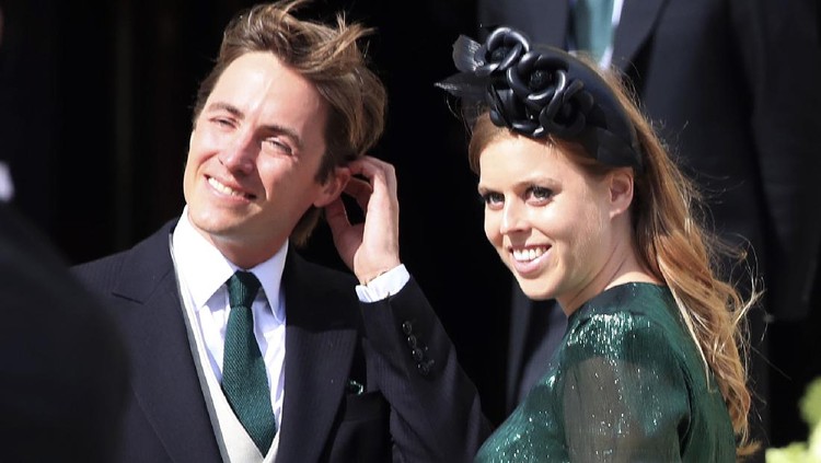 FILE - In this Aug. 31, 2019 file photo, Britain's Princess Beatrice with her fiance, Edoardo Mapelli Mozzi, attend the wedding of Ellie Goulding and Caspar Jopling, in York, England. Buckingham Palace says that Princess Beatrice has got married in a private ceremony, with her grandmother Queen Elizabeth II in attendance. Beatrice married Edoardo Mapelli Mozzi Friday, July 17, 2020 at The Royal Chapel of All Saints at Royal Lodge, Windsor. The monarch, the Duke of Edinburgh and other close family members attended, in line with COVID-19 guidelines. (Peter Byrne/PA via AP, file)