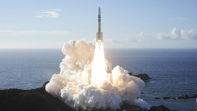 In this photo released by MHI, an H-IIA rocket with United Arab Emirates' Mars orbiter Hope lifts off from Tanegashima Space Center in Kagoshima, southern Japan Monday, July 20, 2020. A United Arab Emirates spacecraft rocketed away Monday on a seven-month journey to Mars, kicking off the Arab world’s first interplanetary mission. (MHI via AP)