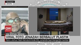 img-title VIDEO: Viral Foto Jenazah Corona Berbalut Plastik