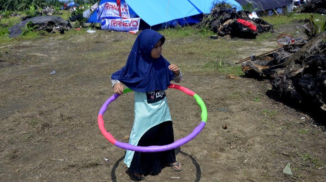 FOTO: Mengobati Trauma Anak-anak Korban Banjir Bandang Luwu