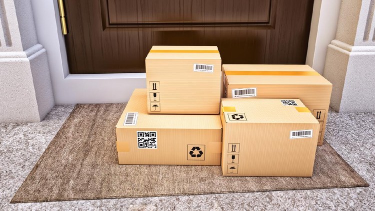 Ilustrasi kiriman paket Cardboard boxes on the door mat near the entrance door