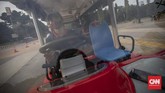 FOTO: Naik Shuttle Bus Gratis di GBK Usai Lelah Berolahraga Pengelola Kawasan Gelora Bung Karno menyediakan shuttle bus gratis bagi warga yang kelelahan setelah berolahraga.