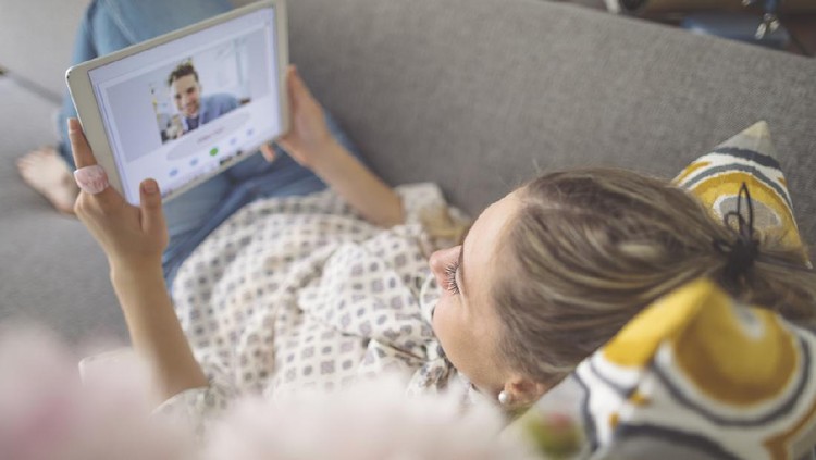 Young woman working at home