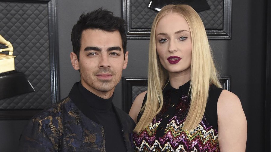 FILE - Joe Jonas, left, and Sophie Turner attend the World Premiere of 