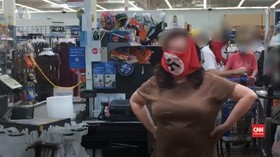 VIDEO: Pakai Masker Berlambang Swastika, Warga AS Dicekal