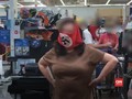 VIDEO: Pakai Masker Berlambang Swastika, Warga AS Dicekal