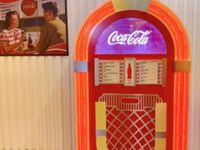 Keren! Begini Tampilan Kafe 'Coca Cola' Pertama di Dunia