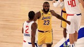 FOTO: Lakers Menang Tipis Atas Clippers Berkat LeBron Los Angeles Lakers menang tipis dua angka atas rival satu kota, Los Angeles Clippers, pada lanjutan NBA musim ini.